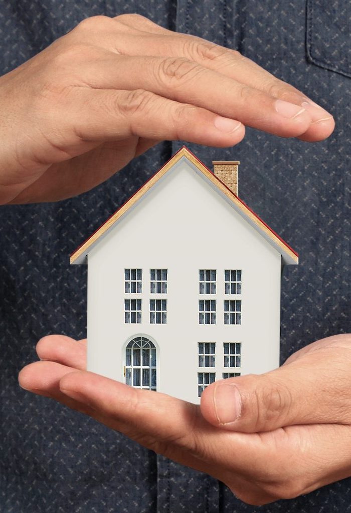 Surveyor in Bristol holding house in Hands